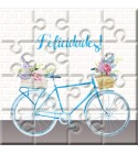 Puzzle bicicleta con la frase “Felicidades” en lata